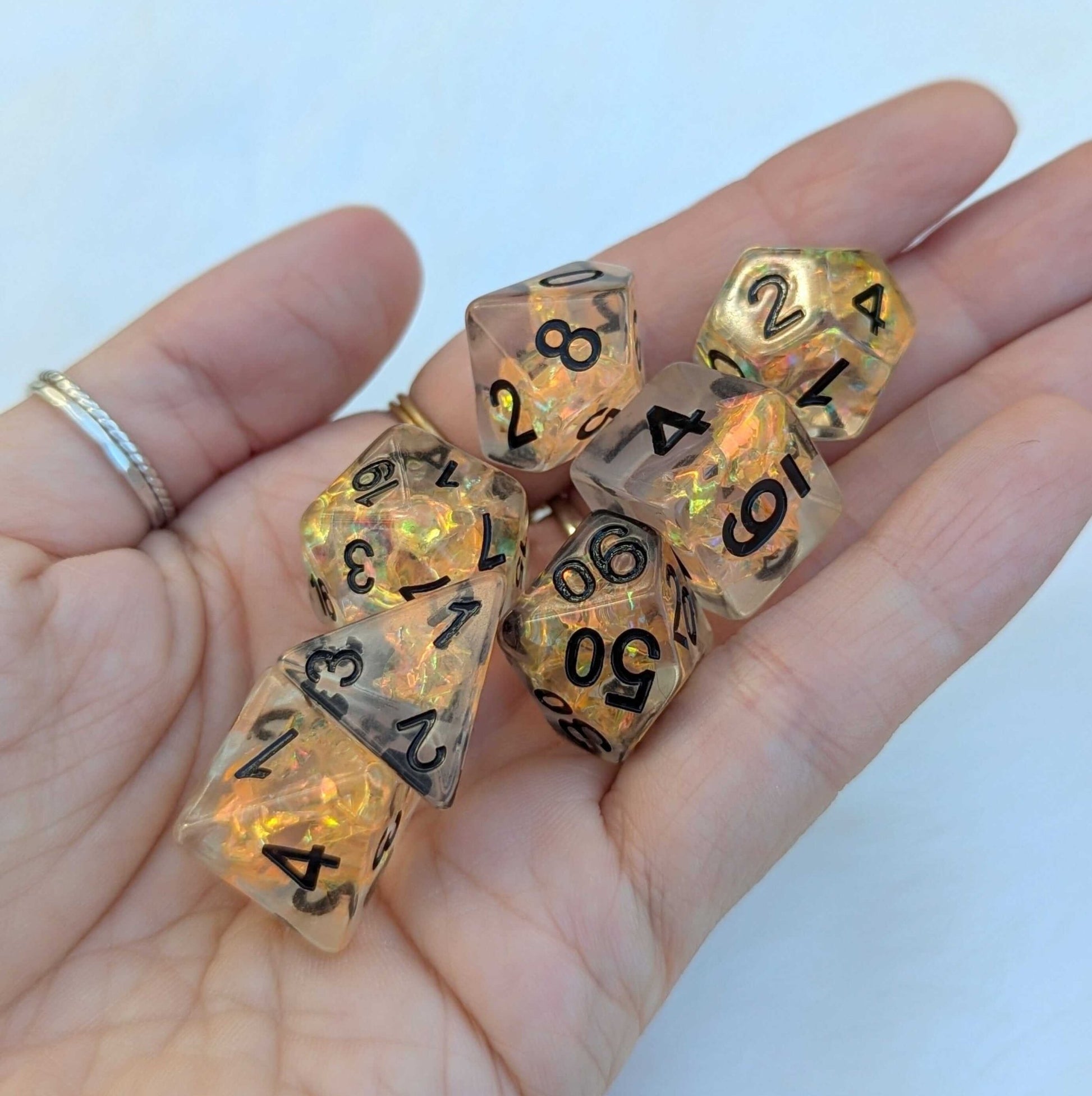 Phoenix's Rebirth Dice Set – 7 - Piece Orange Iridescent Cellophane Black Font - Fennek and Finch