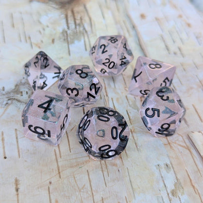 Pink Stardust Dice Set – 7 - Piece Clear Pink Iridescent Glitter Black Font DnD - Fennek and Finch