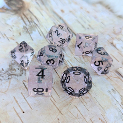 Pink Stardust Dice Set – 7 - Piece Clear Pink Iridescent Glitter Black Font DnD - Fennek and Finch