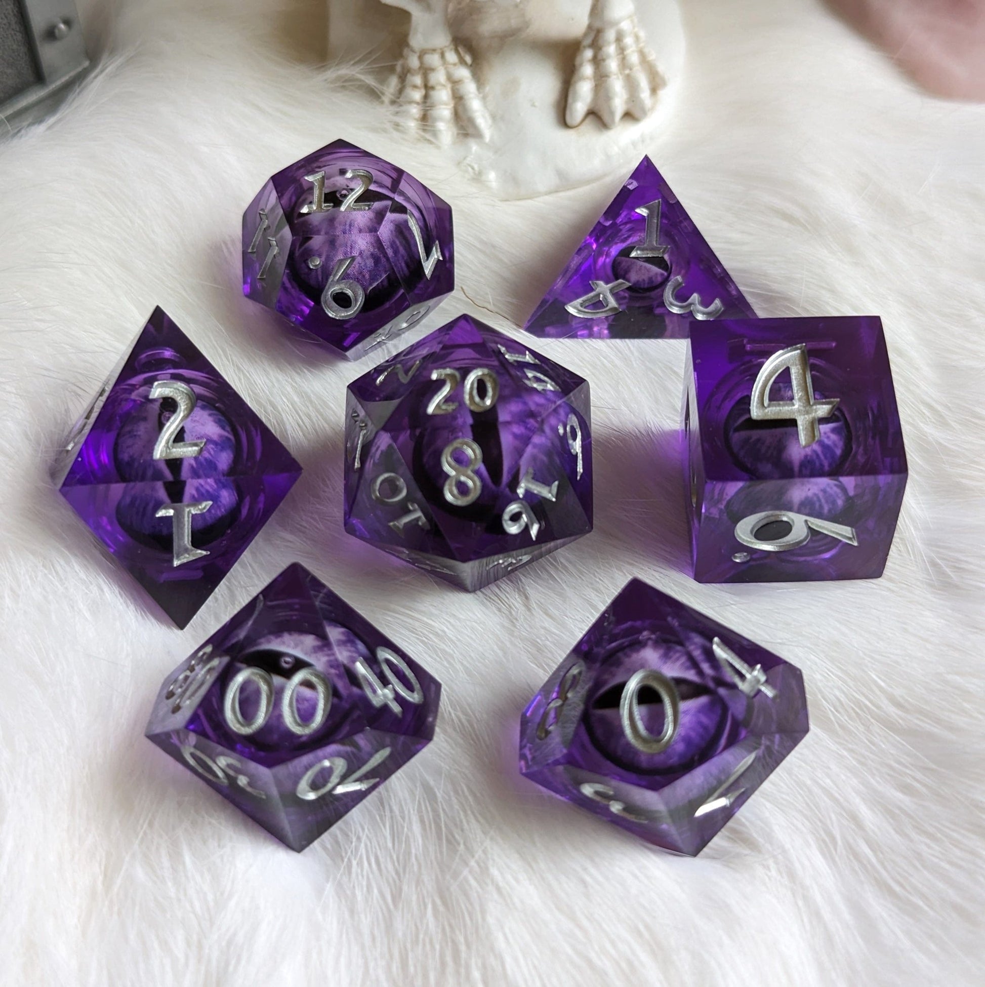 Purple Moving Eye Liquid Core Dice Set – 7 - Piece Sharp Edge Floating Eye DnD - Fennek and Finch
