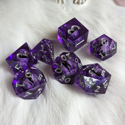 Purple Moving Eye Liquid Core Sharp Edge Resin DnD Dice Set on white background, perfect for tabletop RPGs.