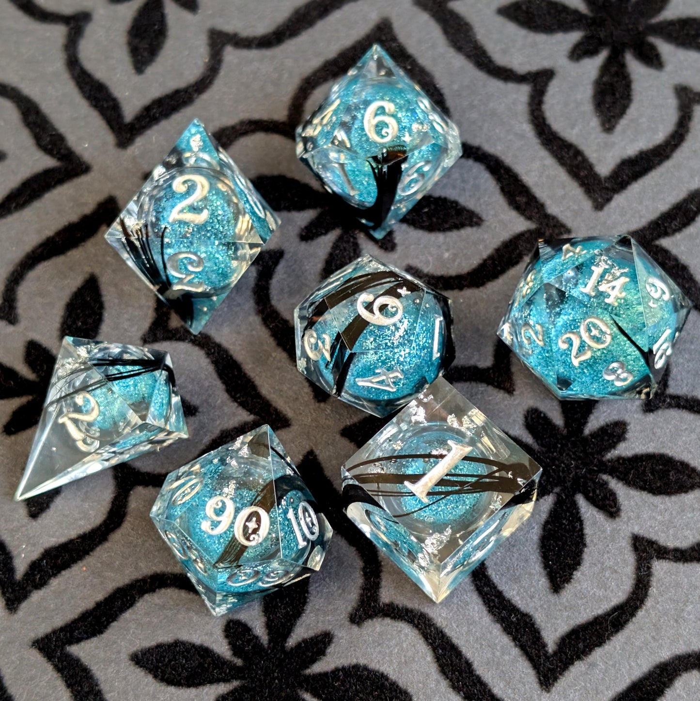 Feather Liquid Core Dice Set – 7pc Sharp Edge with Crystal D4