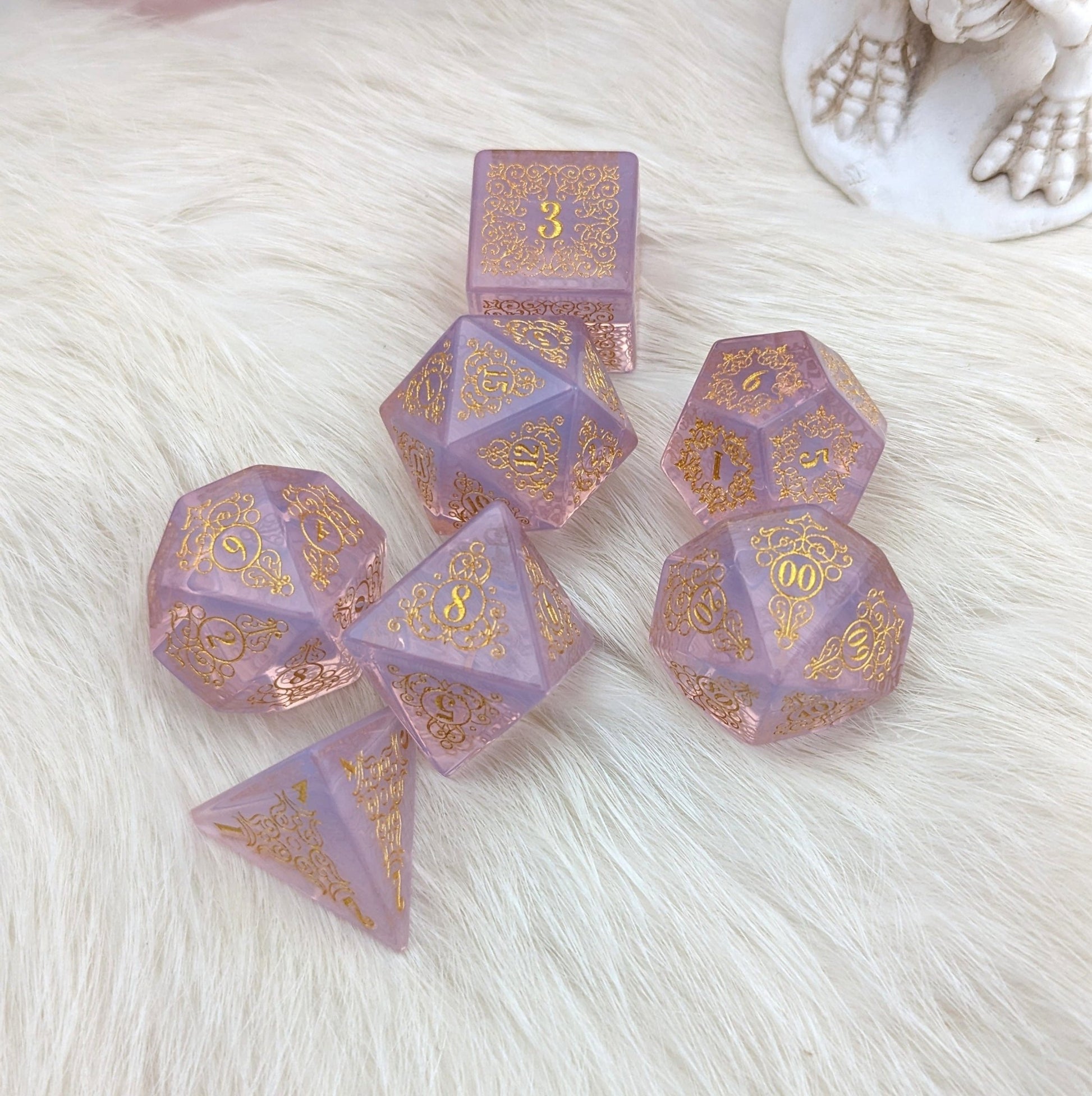 Quartz of Roses Dice Set – Rose Quartz Engraved Gemstone DnD Dice with Gold Font | Fennek & Finch - Fennek and Finch