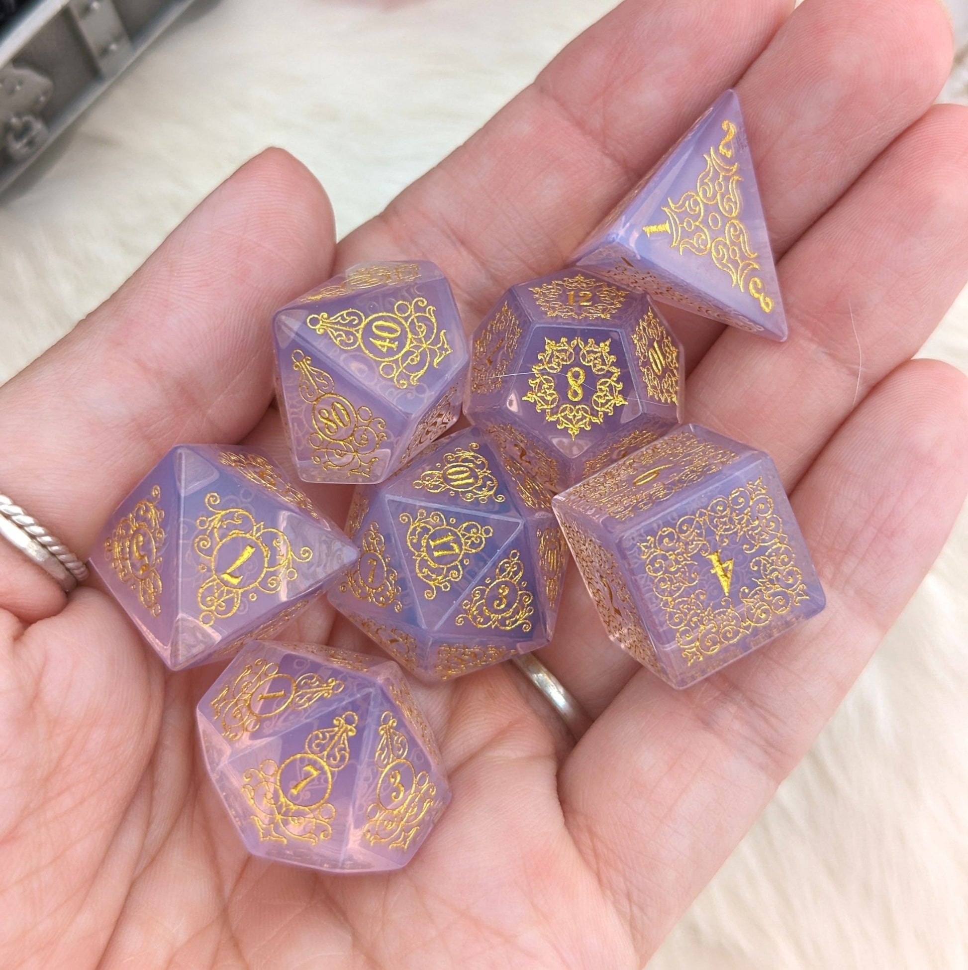 Quartz of Roses Dice Set – Rose Quartz Engraved Gemstone DnD Dice with Gold Font | Fennek & Finch - Fennek and Finch