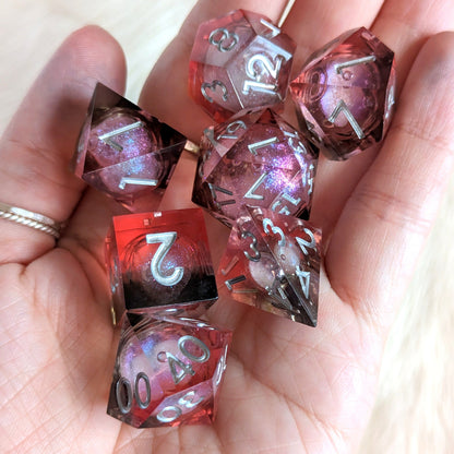 Red and Black Liquid Core Sharp Edge Resin DnD Dice Set