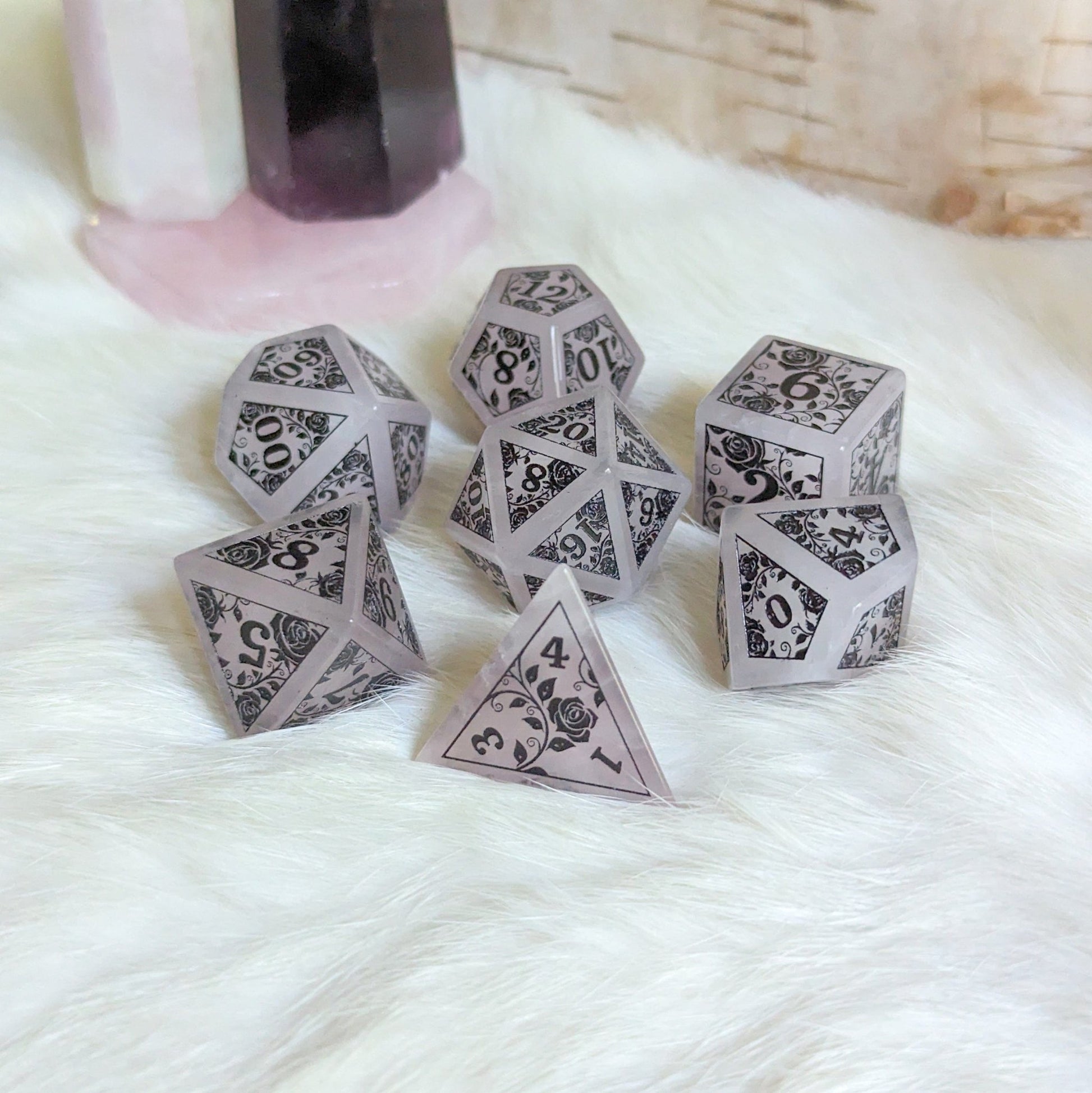Roses on Quartz Dice Set – Rose Quartz Gemstone DnD Dice with Black Font | Fennek & Finch - Fennek and Finch