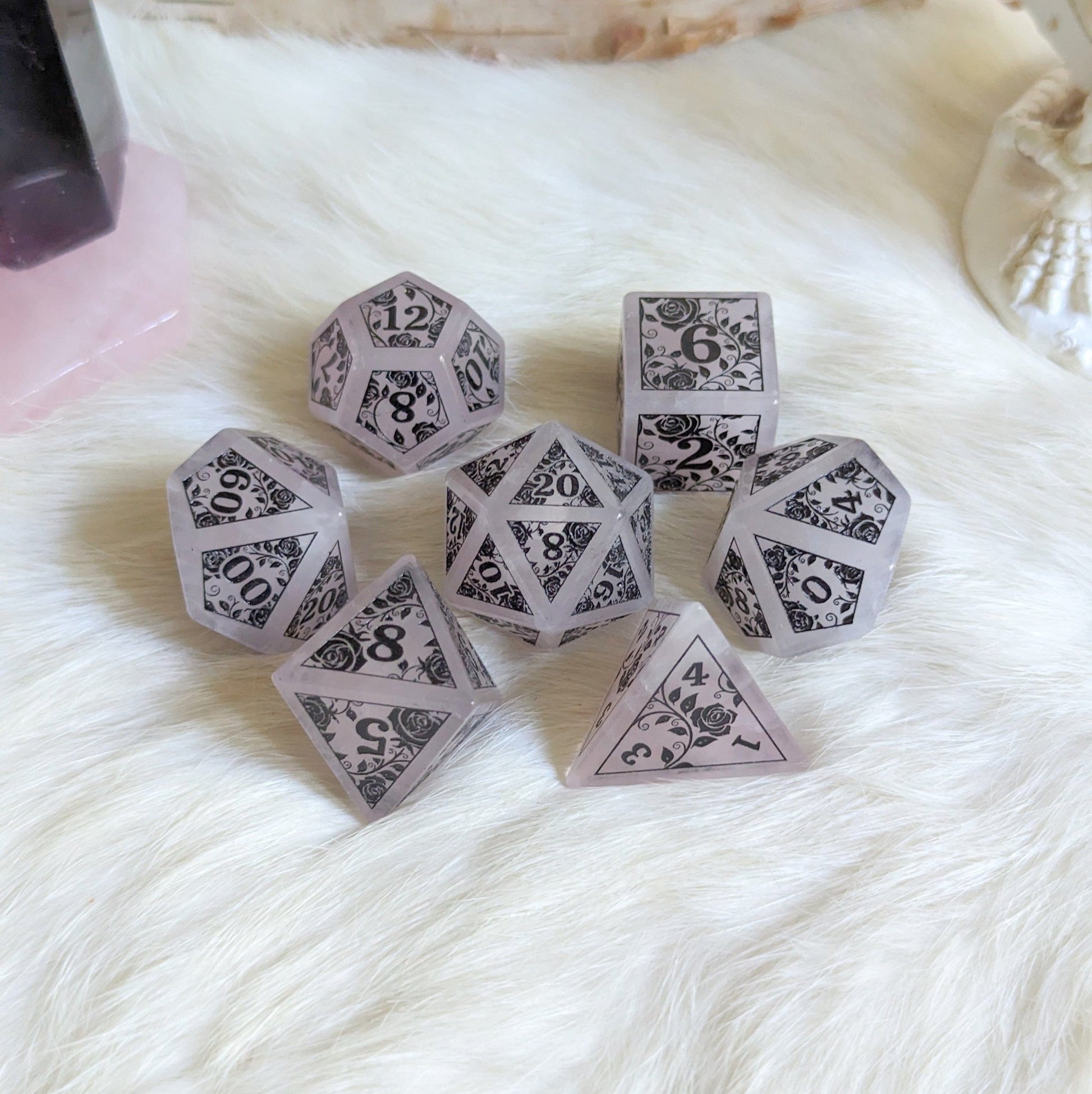 Roses on Quartz Dice Set – Rose Quartz Gemstone DnD Dice with Black Font | Fennek & Finch - Fennek and Finch