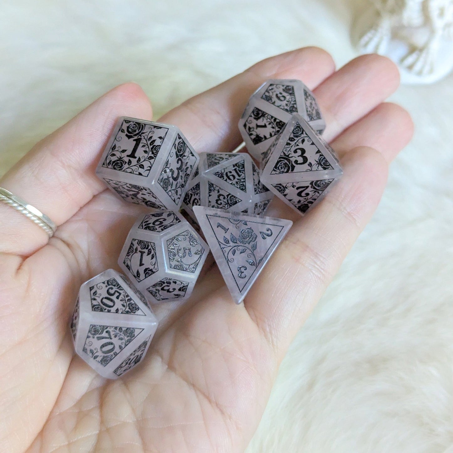 Roses on Quartz Dice Set – Rose Quartz Gemstone DnD Dice with Black Font | Fennek & Finch - Fennek and Finch