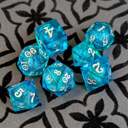 Teal Layered Liquid Core Dice Set – 7pc Sharp Edge with Crystal D4 - Fennek and Finch