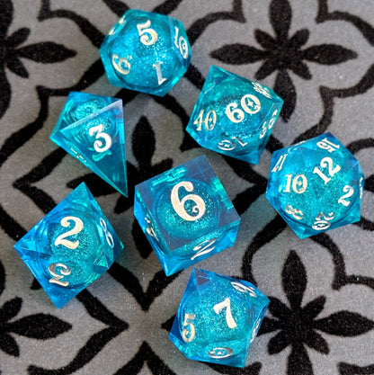 Teal Layered Liquid Core Dice Set – 7pc Sharp Edge with Crystal D4 - Fennek and Finch