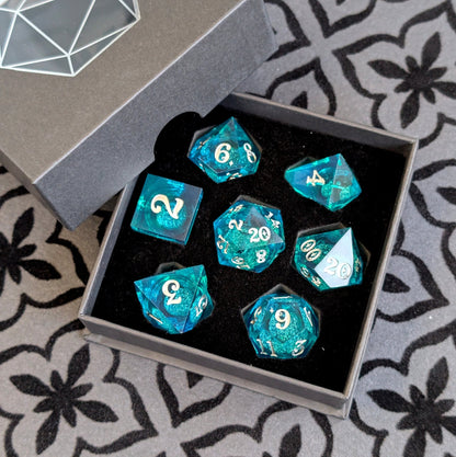 Teal Layered Liquid Core Dice Set – 7pc Sharp Edge with Crystal D4 - Fennek and Finch