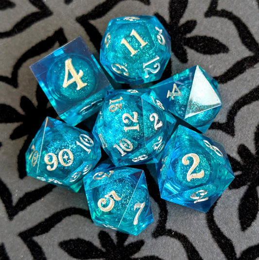 Teal Layered Liquid Core Dice Set – 7pc Sharp Edge with Crystal D4 - Fennek and Finch