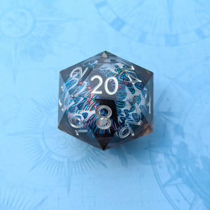 The Watchful Eye D20 Clear Resin Die with Mesmerizing Blue, White, and Black Eye Design on a Light Blue Background