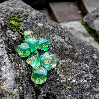 Arrow Shift Dice Set – 7 - Piece Clear Green Ink Suspended Acrylic DnD Dice - Fennek and Finch