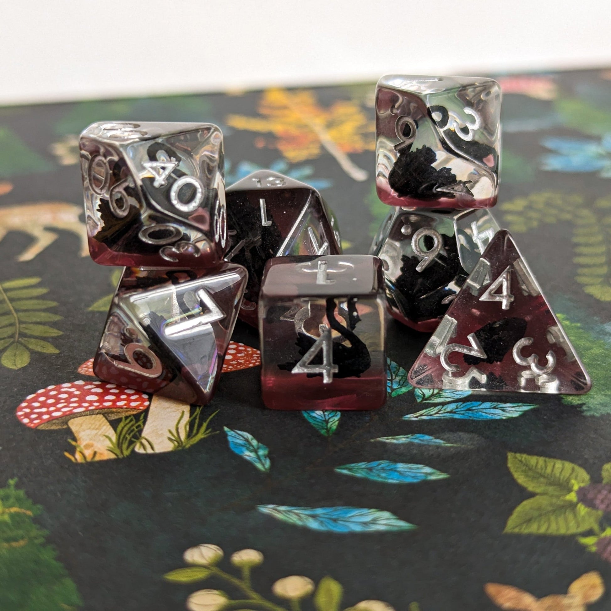 Black Swan DnD Dice Set – 7 - Piece Purple Resin Swan Inclusion Dice - Fennek and Finch