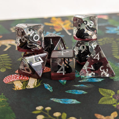 Black Swan DnD Dice Set – 7 - Piece Purple Resin Swan Inclusion Dice - Fennek and Finch