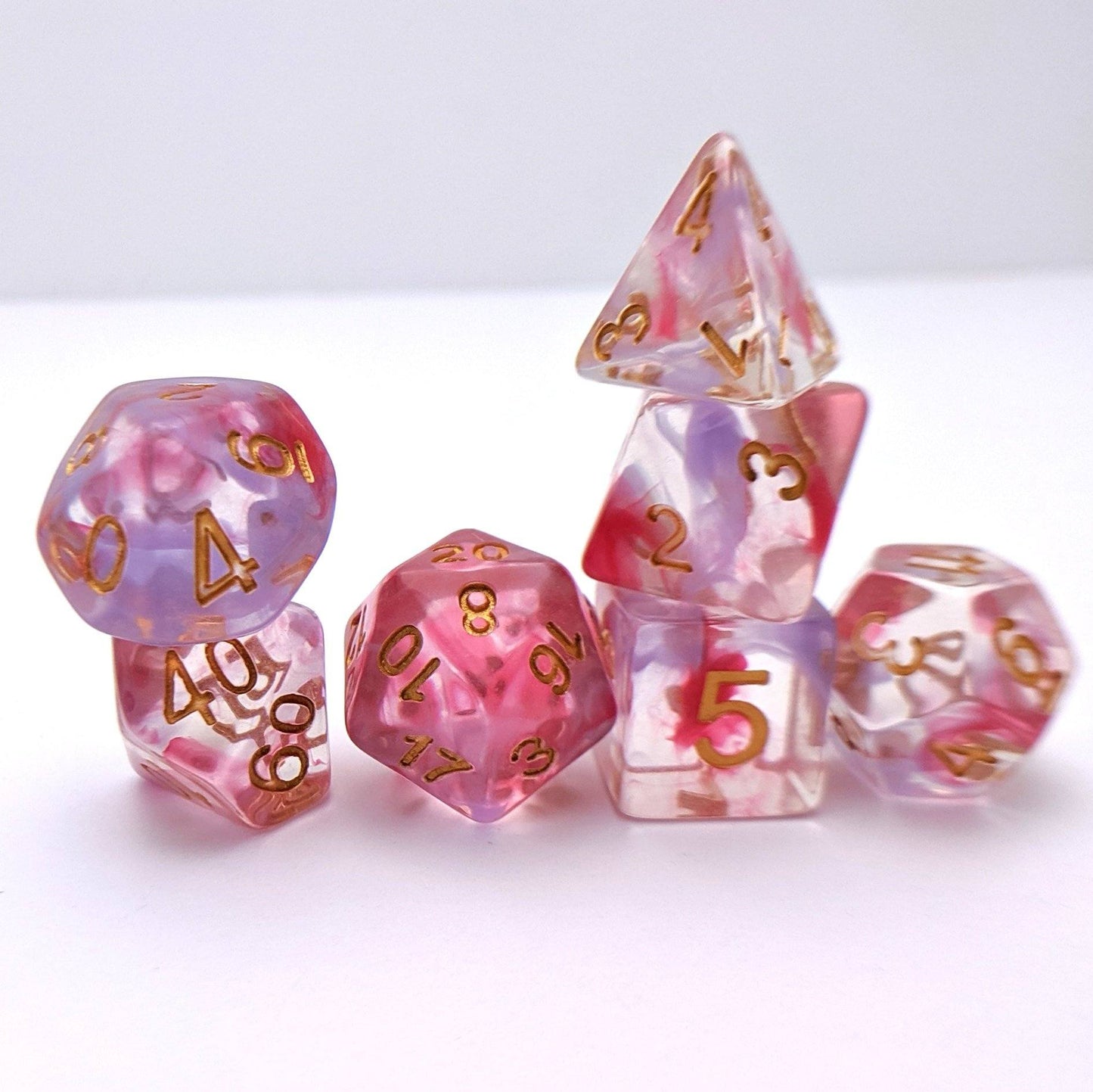 Bleeding Heart Dice Set – 7-Piece Translucent Purple Pink Ink Swirls Resin DnD Dice sets Fennek and Finch