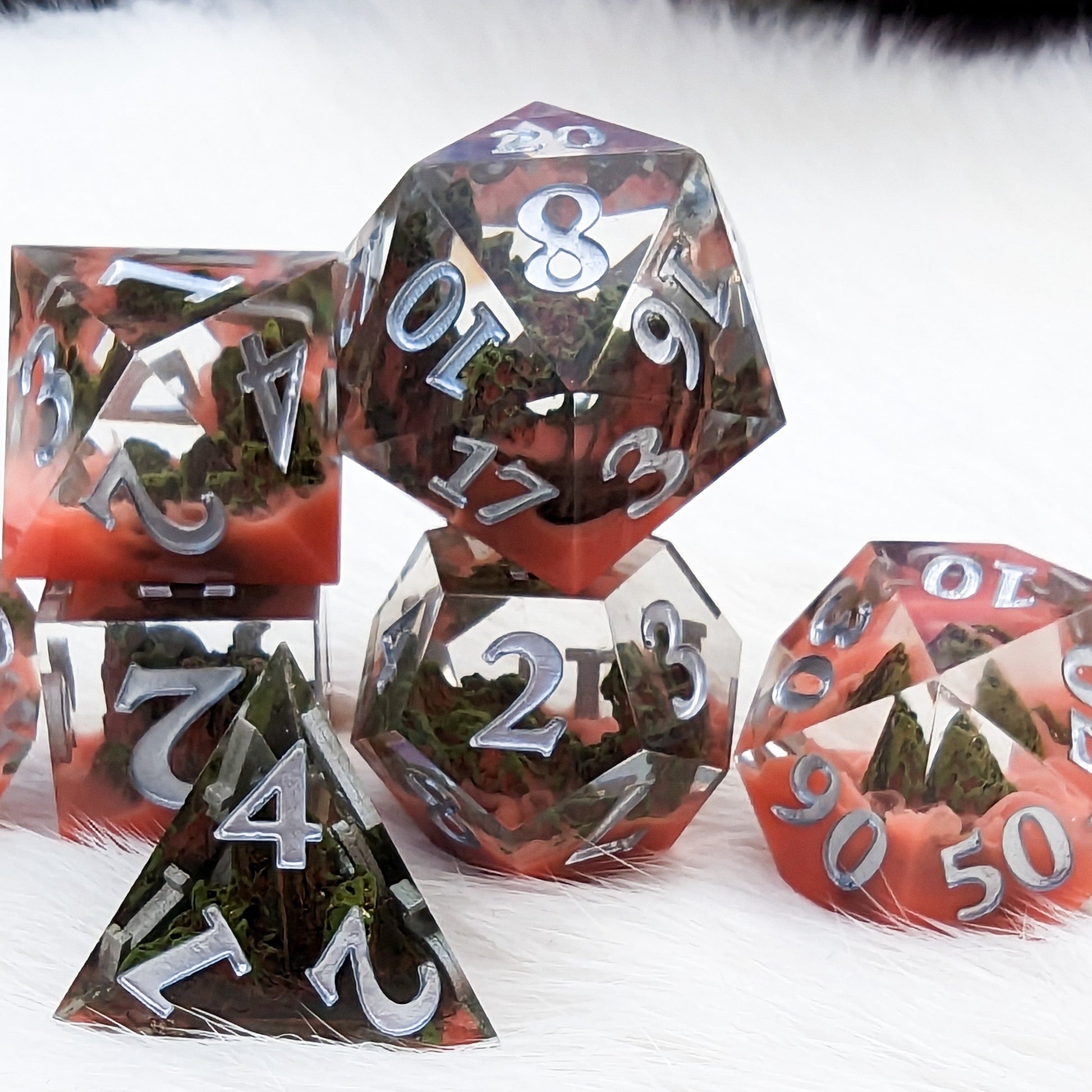 Blood Mountain Sharp Edge Resin DnD Dice Set with mountain and red mist design, ideal for tabletop role-playing games.