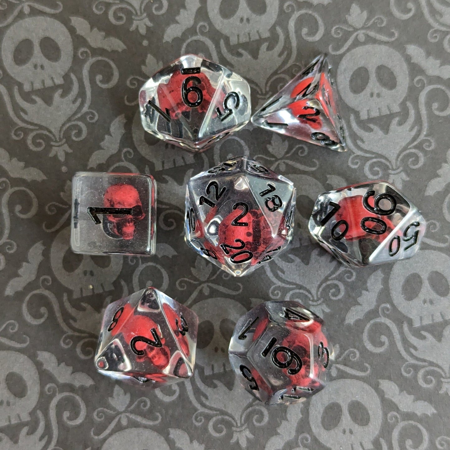 Blood Skull Dice Set – 7 - Piece Dark Red Skull Clear Resin DnD Dice - Fennek and Finch