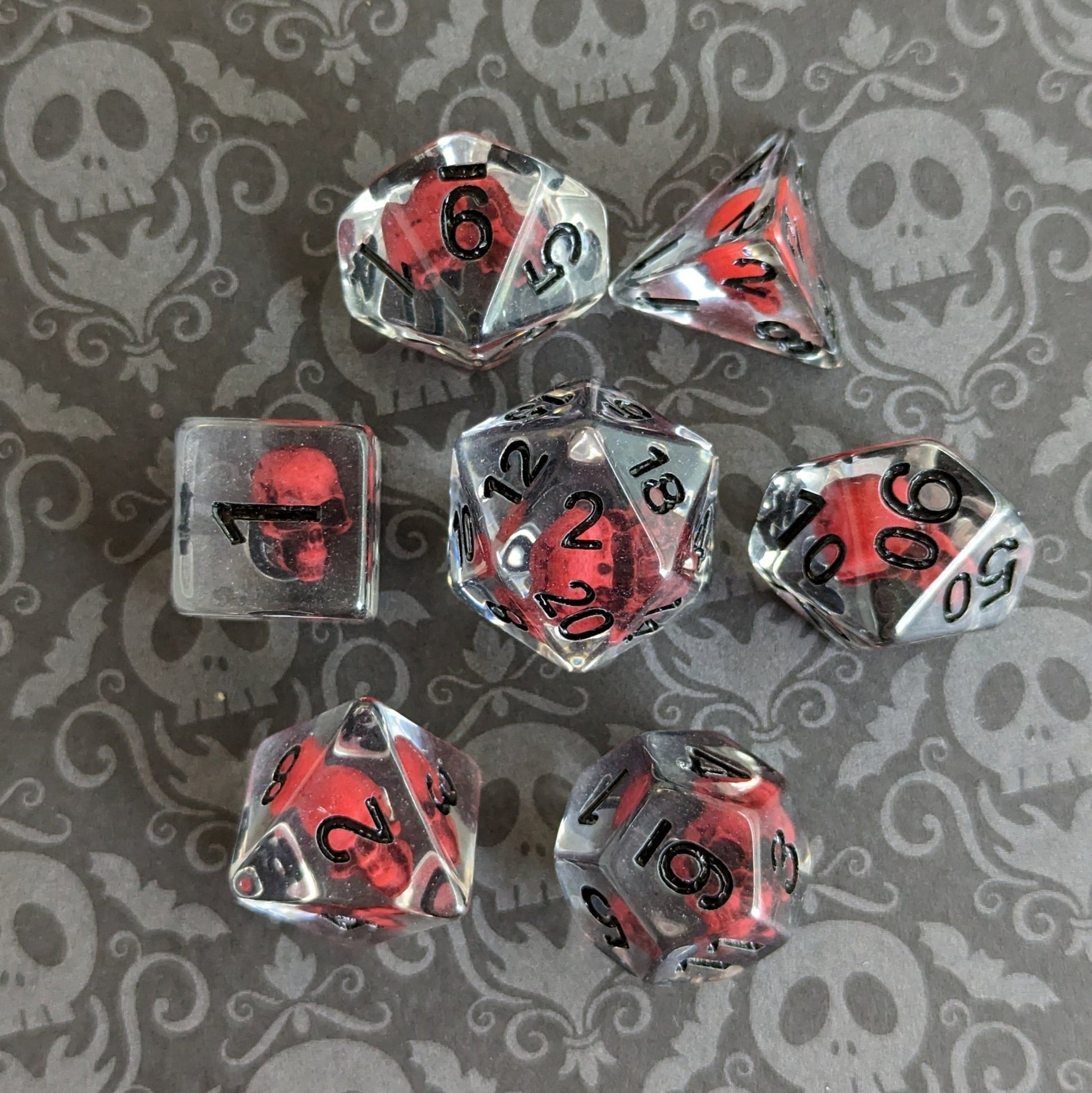 Blood Skull Dice Set – 7 - Piece Dark Red Skull Clear Resin DnD Dice - Fennek and Finch