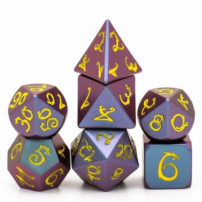 Blue and purple dragon metal dice set with yellow font for tabletop RPGs like Dungeons and Dragons, includes 7 polyhedral dice.