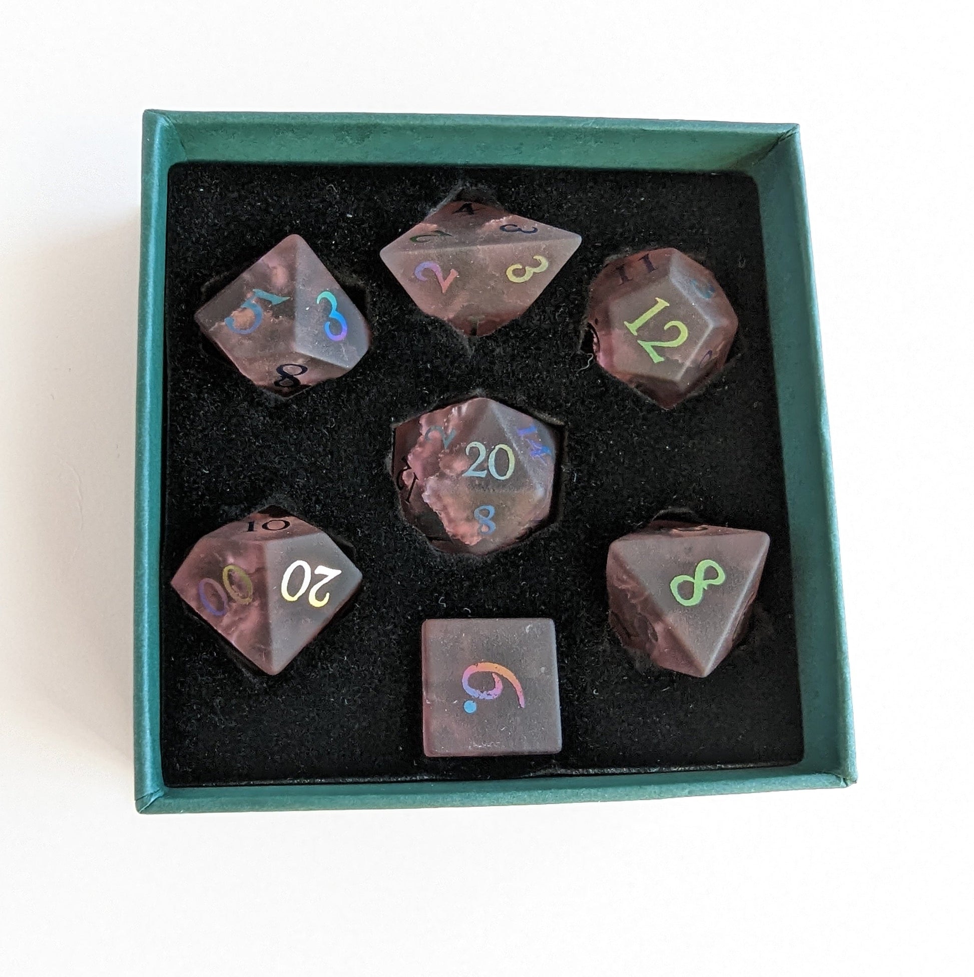 Burgundy crackled glass dice set in box, featuring seven dice including a d20 and d12, ideal for DnD players.