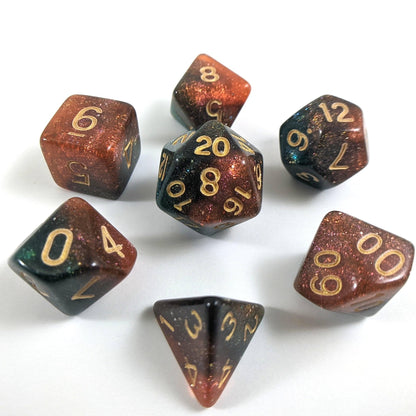 Carina Nebula Dice Set with orange and green marbled design and micro shimmer, 7 polyhedral dice for TTRPGs and Magic The Gathering.