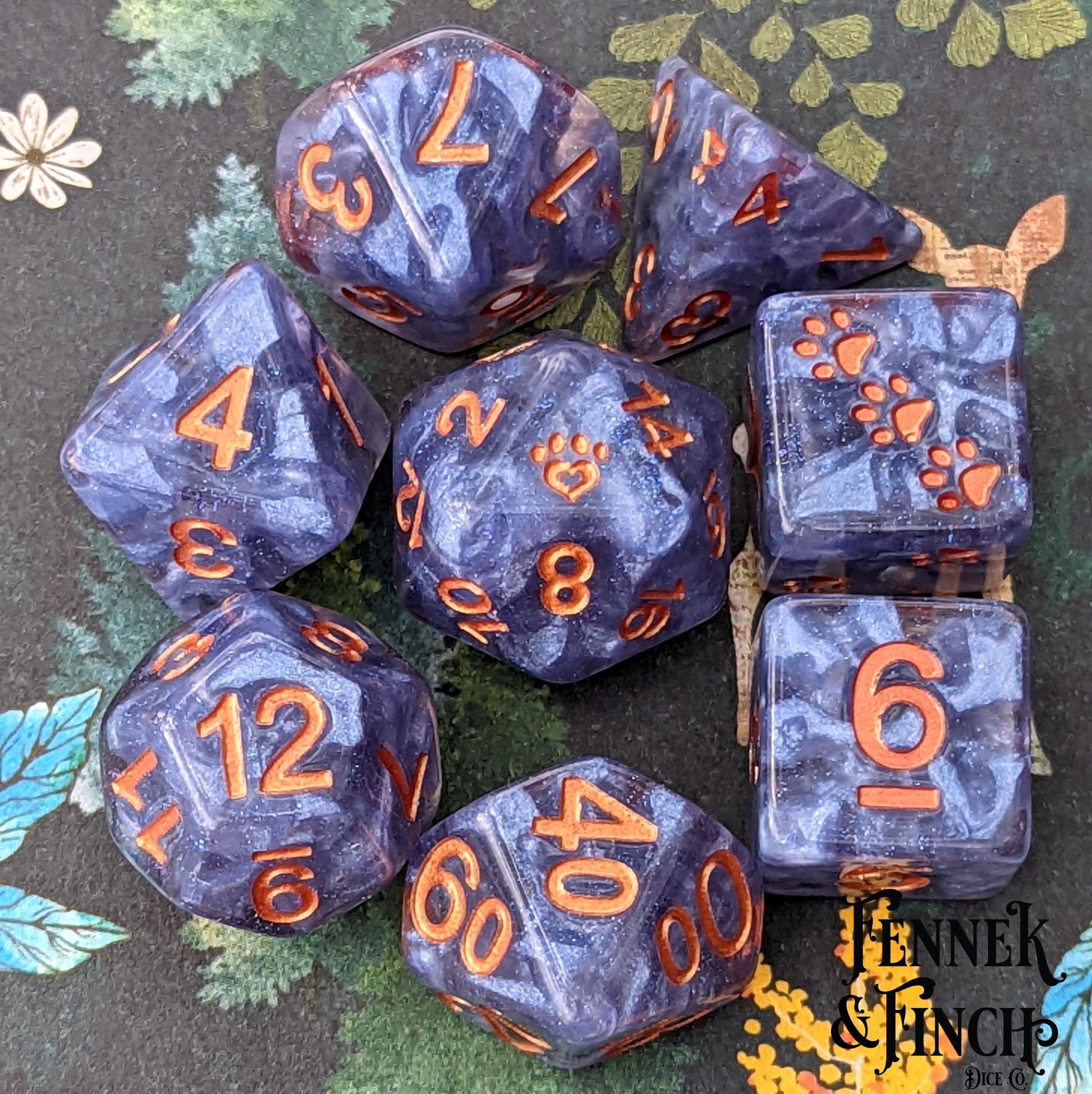 Ceanothus 8 Piece Dice Set. Clear resin with pearly blue violet clouds and copper font.