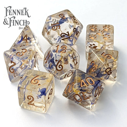 Cornflower and Calendula Flower Petal Dice Set with cat wizard design and custom font by Therin, featuring dried petals in clear resin.