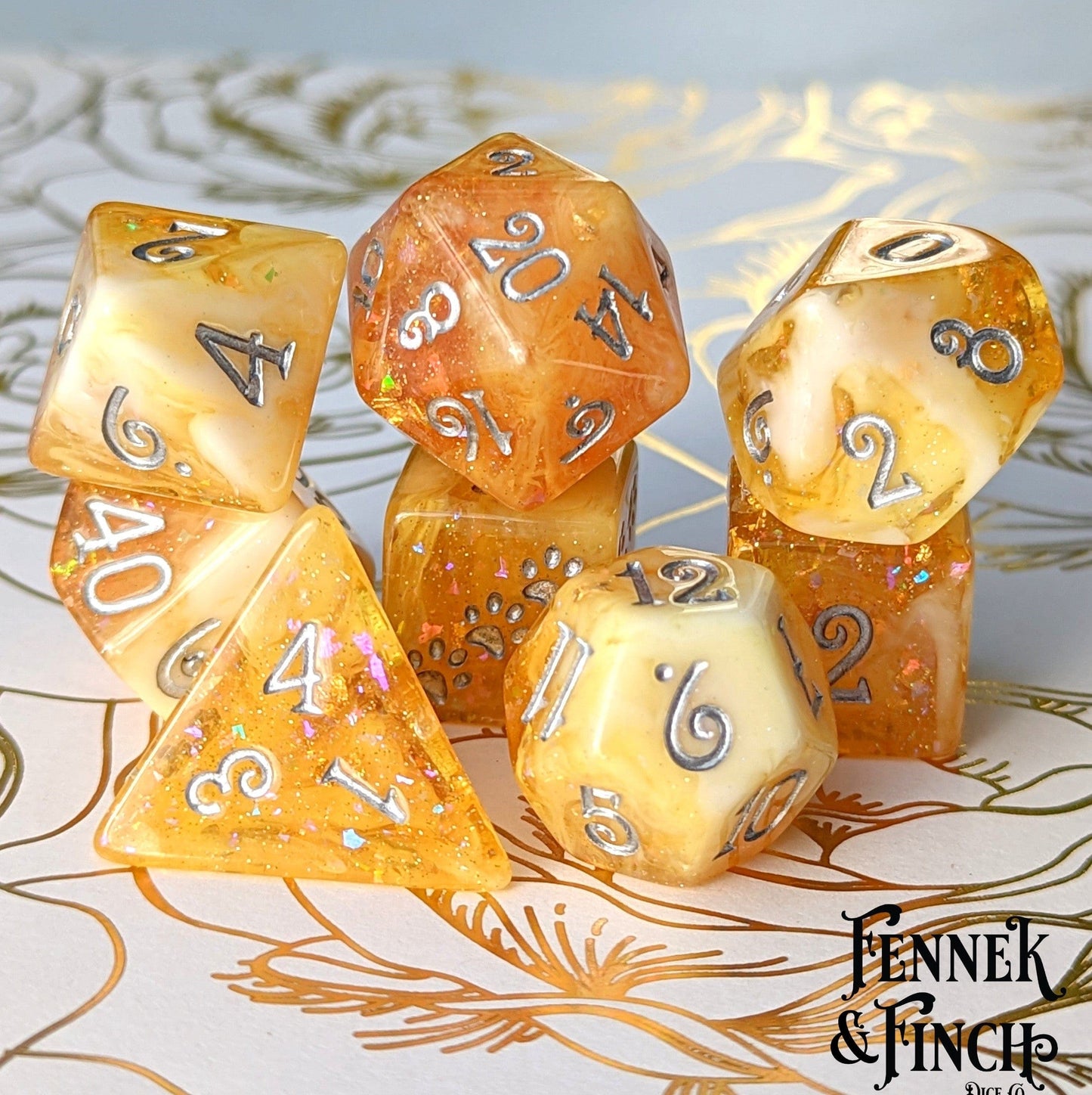 Crystallized Honey 8 Piece Dice Set. Clear Orange and White Marble, with Glitter and Foil