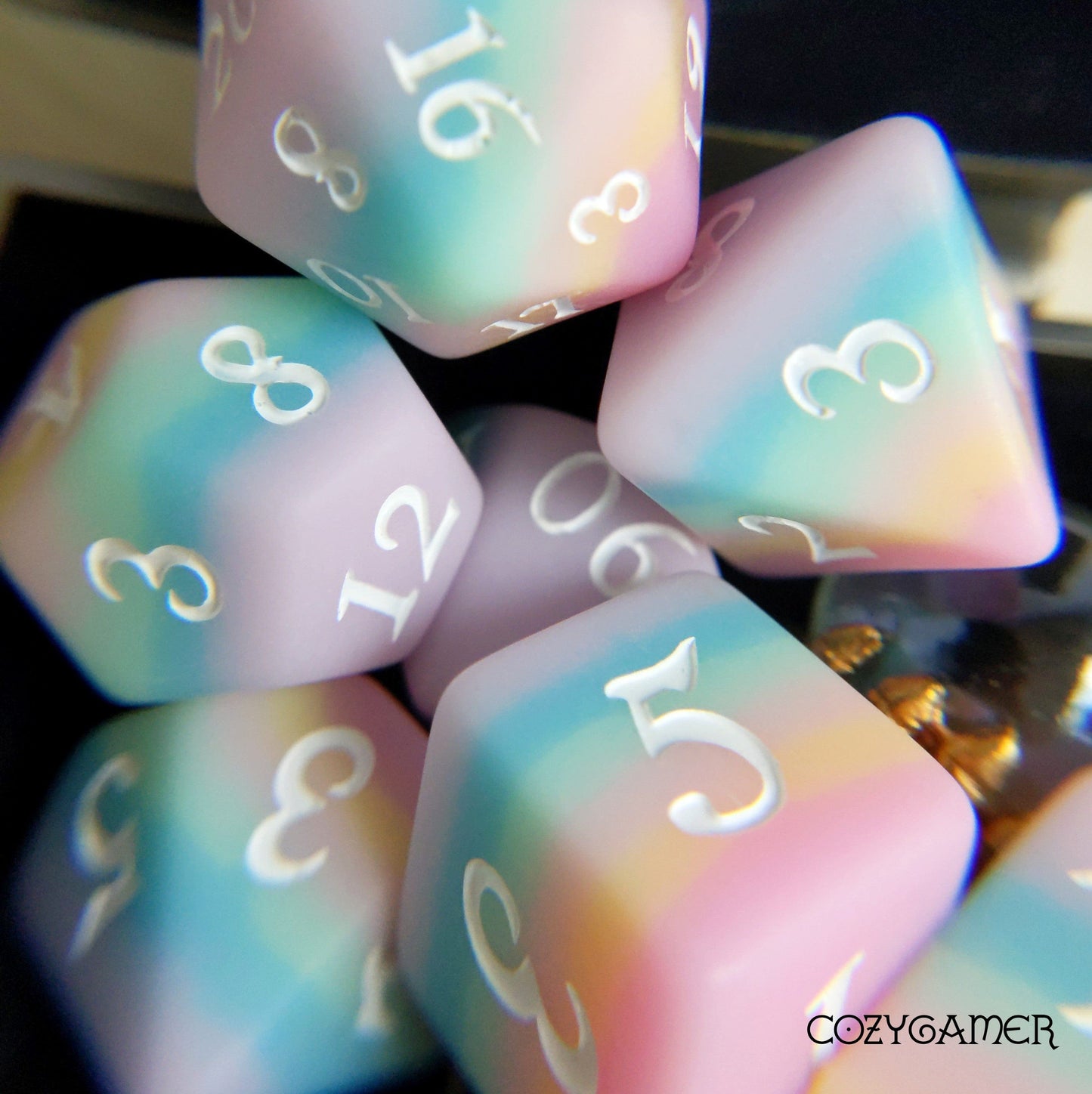 Dazed and Dreamy, a pastel rainbow matte DND dice set