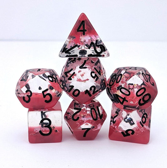 Deadly Puzzle Dice Set – 7 - Piece Red Translucent Puzzle Piece Glitter DnD Dice - Fennek and Finch