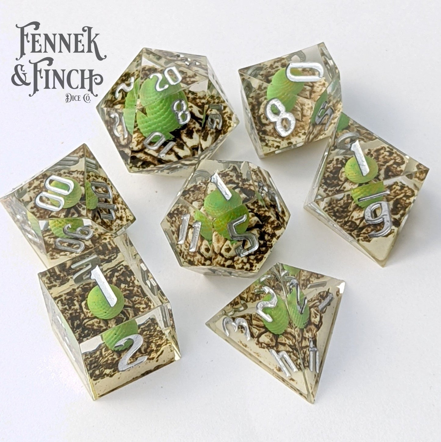 Dragon Egg Sharp Edge Dice Set – 7 - Piece Green Egg DnD Dice - Fennek and Finch