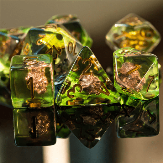 Druid's Wolf Dice Set with tiny wolf head symbols, 7-piece polyhedral for tabletop RPGs, shown in green and gold reflective detail.