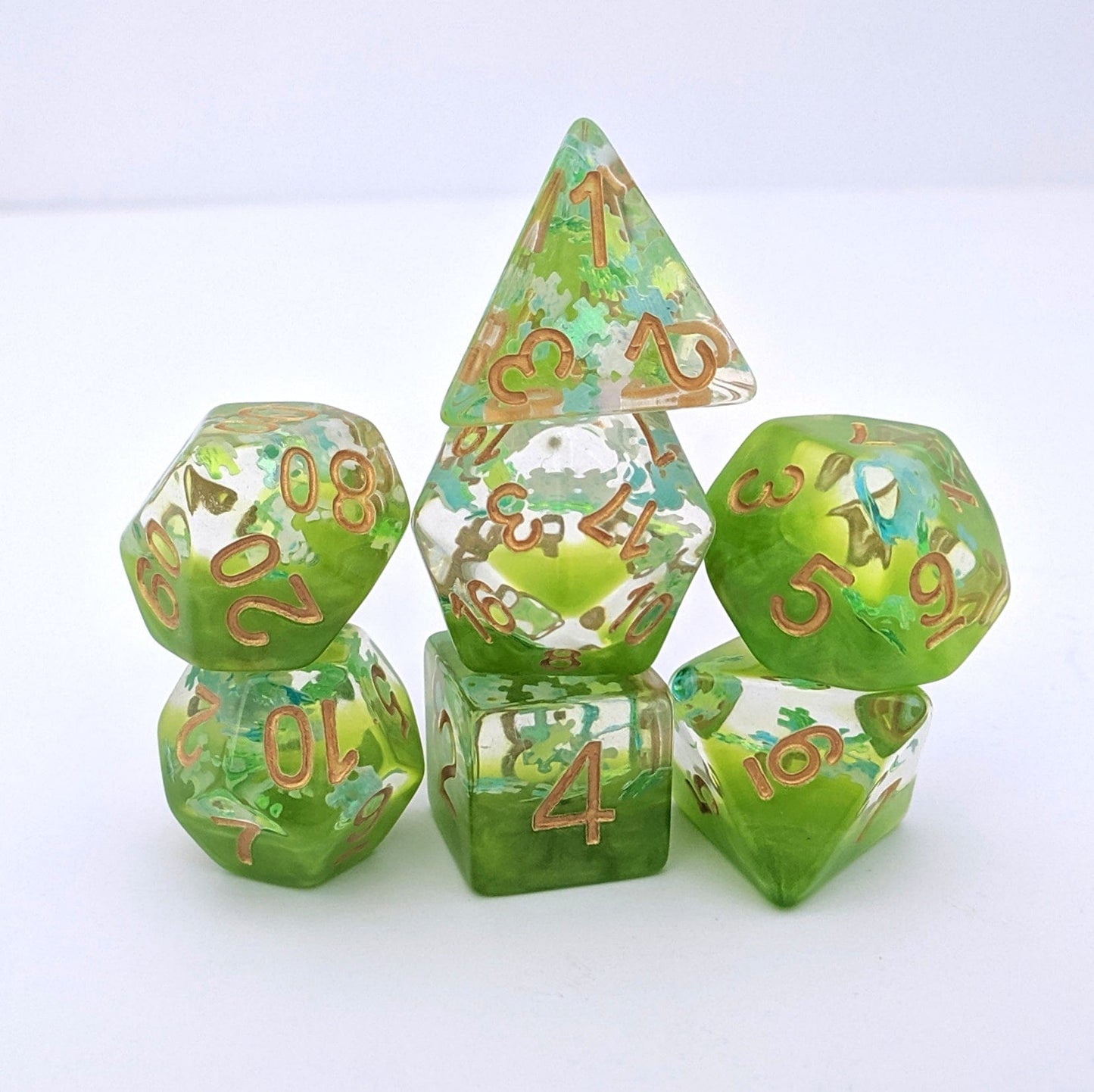 Elven Riddle Dice Set – 7 - Piece Green Translucent Puzzle Piece Glitter DnD Dice - Fennek and Finch
