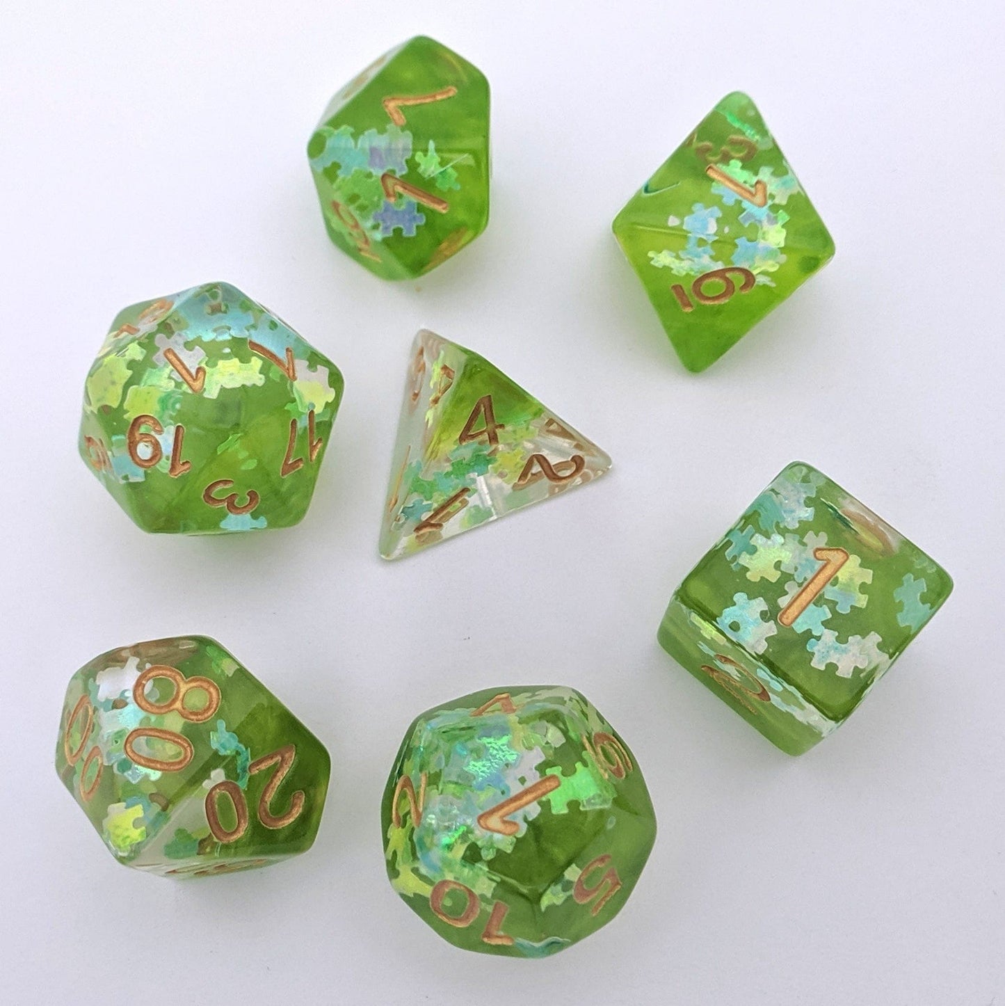 Elven Riddle Dice Set – 7 - Piece Green Translucent Puzzle Piece Glitter DnD Dice - Fennek and Finch