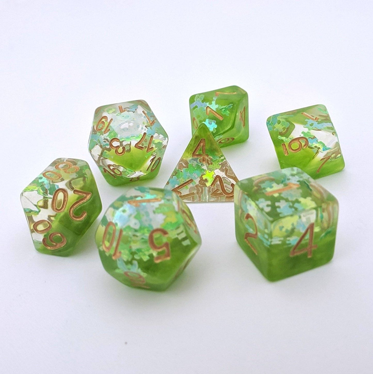 Elven Riddle Dice Set – 7 - Piece Green Translucent Puzzle Piece Glitter DnD Dice - Fennek and Finch