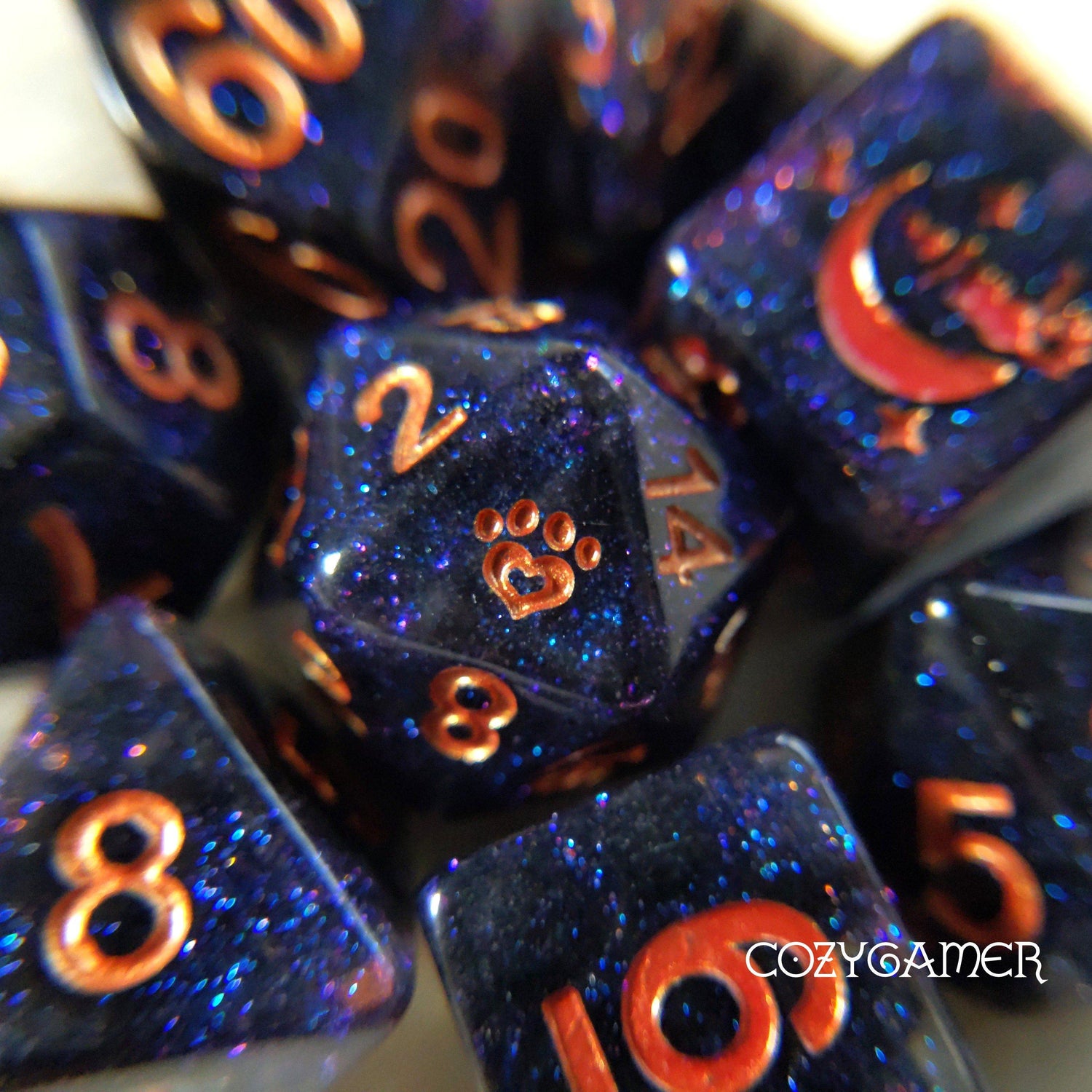 "Endless Expanse DnD Dice Set, 8 Piece, featuring copper numbers and cat wizard design on shimmering black glitter resin"