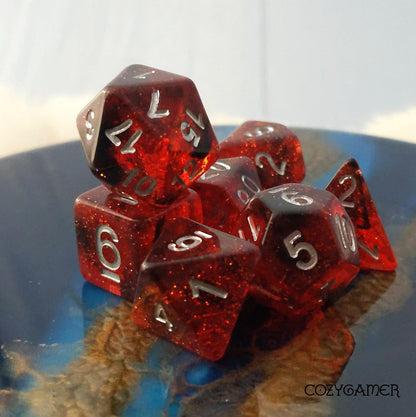 Fiery Core Dice Set – 7 - Piece Translucent Red Black Ink Glitter DnD Dice - Fennek and Finch