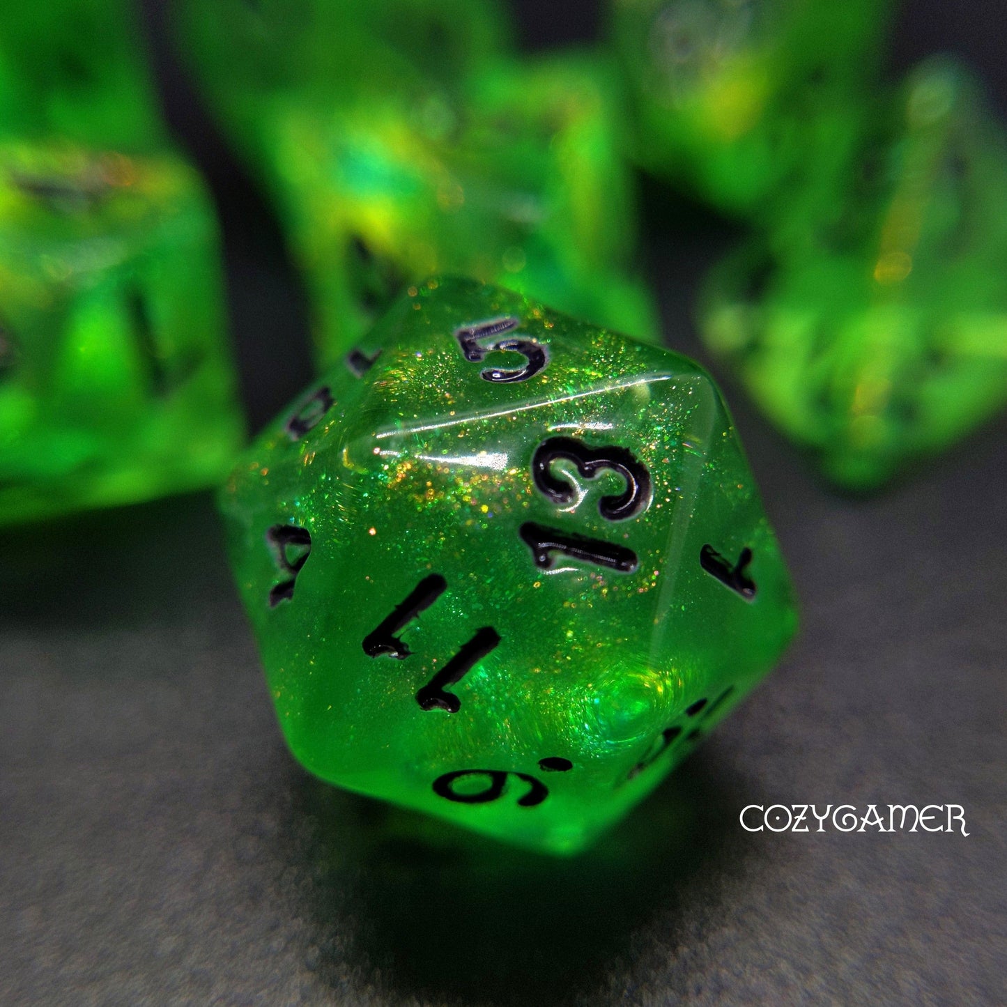 Forest Green Will O Wisp Glitter Dice Set for TTRPGs, 7 piece polyhedral set with black font, perfect for Dungeons and Dragons.