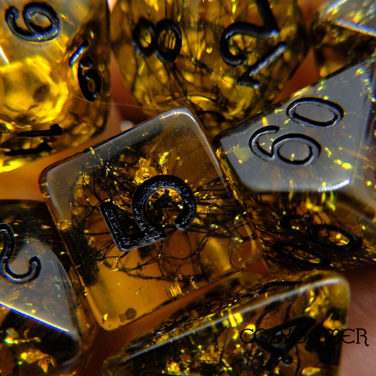 Gilded Web Dice Set. 7 Piece Black shimmering threads and gold foil