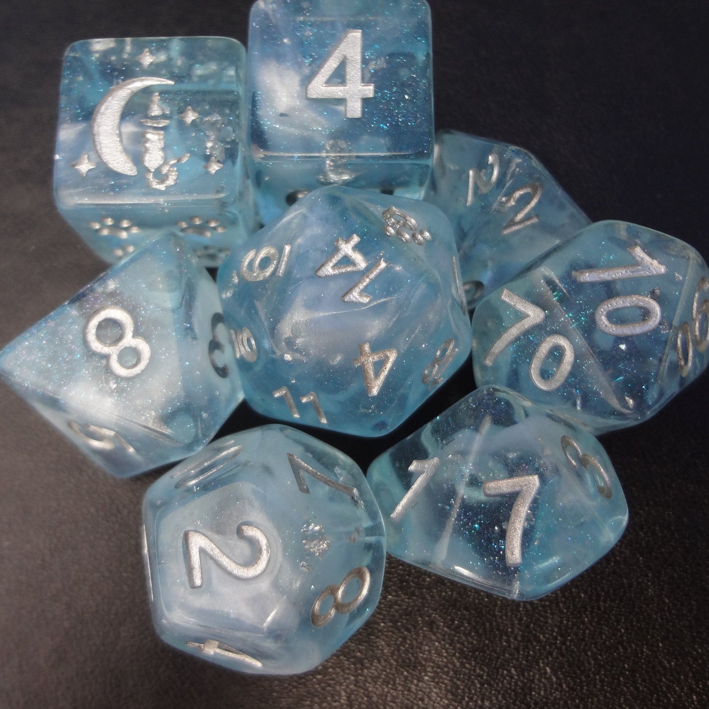 Glacial Ice 8 Piece Dice Set. Light clear blue with pearly white clouds and silver foil within. - CozyGamer