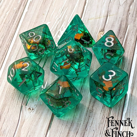 Goldfish Pond. Teal resin dice set with gold fish and plants