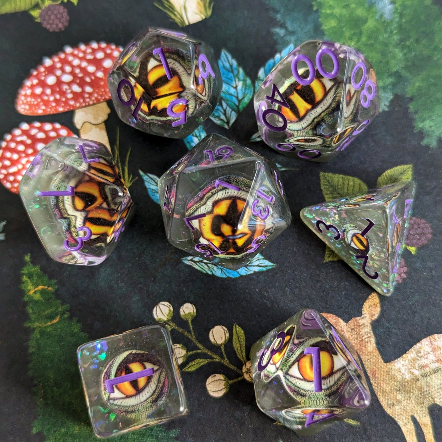 Green Eye DnD Dice Set Purple Font – 7 - Piece Green Resin Eye Inclusion Dice - Fennek and Finch