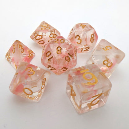 Harvest Moon Dice Set – 7-Piece Translucent Coral White Stars Gold Font DnD Dice sets Fennek and Finch