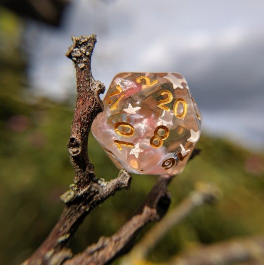 Harvest Moon Dice Set – 7 - Piece Translucent Coral White Stars Gold Font DnD - Fennek and Finch