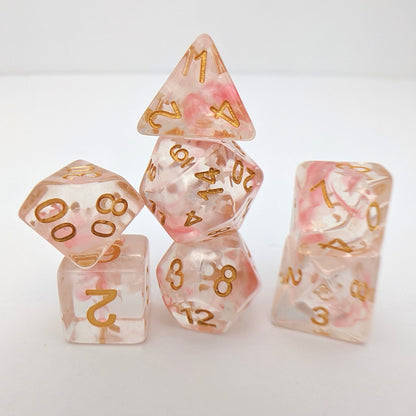 Harvest Moon Dice Set – 7-Piece Translucent Coral White Stars Gold Font DnD Dice sets Fennek and Finch