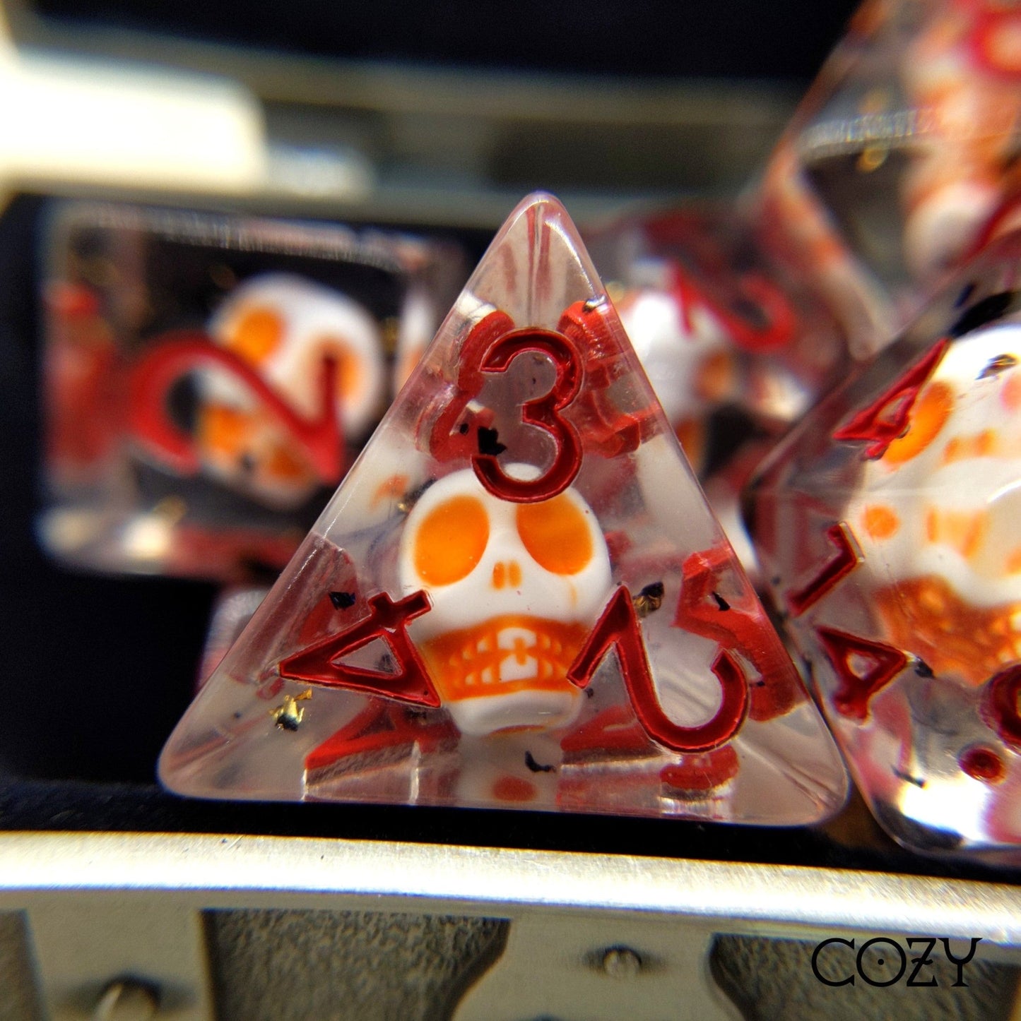 Haunted Skull Dice Set – 7 - Piece White Skull Orange Black Glitter Red Font DnD - Fennek and Finch