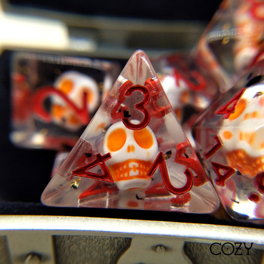 Haunted Skull Dice Set – 7 - Piece White Skull Orange Black Glitter Red Font DnD - Fennek and Finch