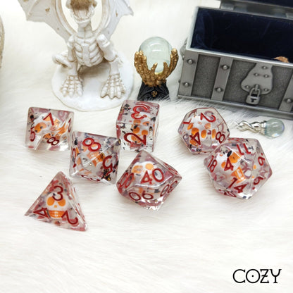 Haunted Skull Dice Set – 7 - Piece White Skull Orange Black Glitter Red Font DnD - Fennek and Finch